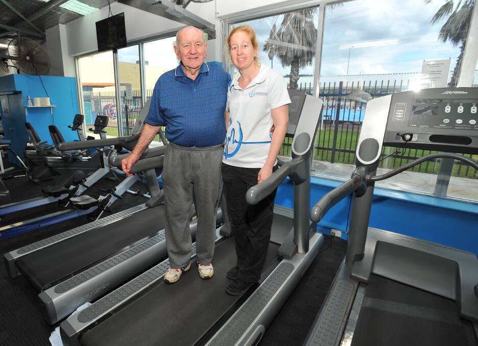 EXERCISE FOR MENTAL HEALTH: Client Alan Edwards on the treadmill with exercise physiologist Liz Coolee. Picture: Kieren L Tilly