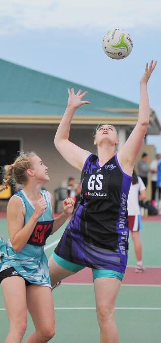 EYES ON THE PRIZE: Shooting Stars goal shooter Jenee West looks to gather in a ball against Uranquinty in Wagga netball on Saturday. Pictures: Kieren L Tilly