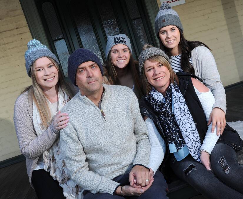 Beanies for Brain Cancer: Laura, Alyce, Maddie and their mum Cathy Reid will wear beanies to support their dad, Geoff. Picture: Laura Hardwick 