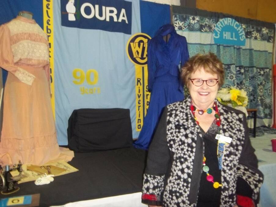 SHOWTIME: Anne Phegan of Riverina Group CWA in front of Oura’s display in the CWA competition at the Wagga Show. Picture: Contributed.