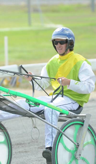 DRIVE: Blake Jones relaxes after winning with Thatlovefeeling during Race 1. Pictures: Laura Hardwick