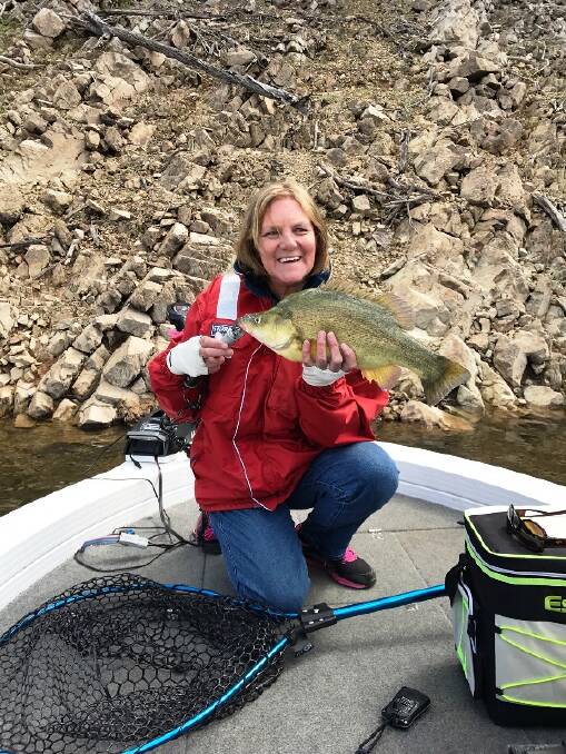 NICE ONE: Jayney Charlton with a yella from Burrinjuck. Go, get amongst the fishing and send the pictures to  craig@waggamarine.com.au or 0419 493 313.