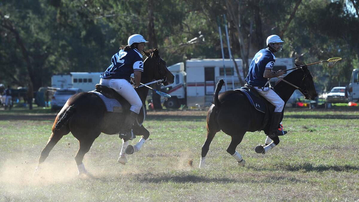 THRILLING: Matt Davidson and Bec Carter compete during the polocrosse carnival at Euberta at the weekend. Picture: Laura Hardwick
