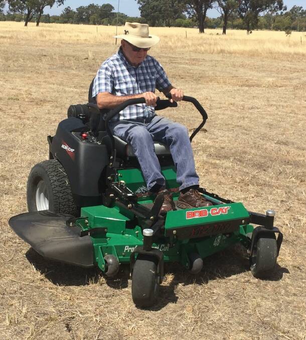 HELP: Hubert Hassall gives Explorers Rifle Club's new ride on a run. The mower was purchased using a grant from Lockhart Community Bendigo Bank. Picture: Contributed