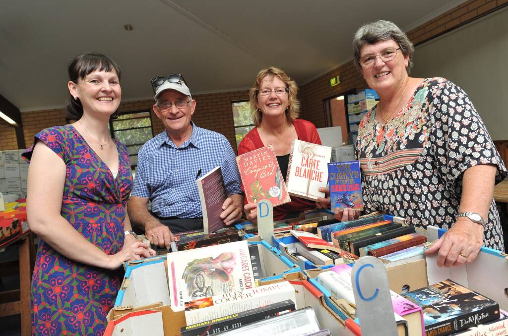 SALE: Danielle Gamble, Bruce Durham, Janine Menzies and Robyn James at the monster garage sale. Picture: Laura Hardwick 