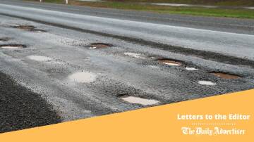 One letter-writer is wondering if Wagga City Council has stumbled over an new way to slow drivers down at intersections - potholes. File picture