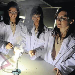 Kooringal High School year 12 students Arupam Raman, Ishita Gupta and Milica Rancic conduct a tricky experiment in the school’s  science laboratory. The talented trio recently returned from the National Youth Science.                                  Picture: Michael Frogley