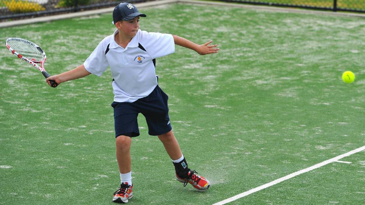 Alistair Driver competes in the Riverina Junior Tennis Open. Picture: Addison Hamilton