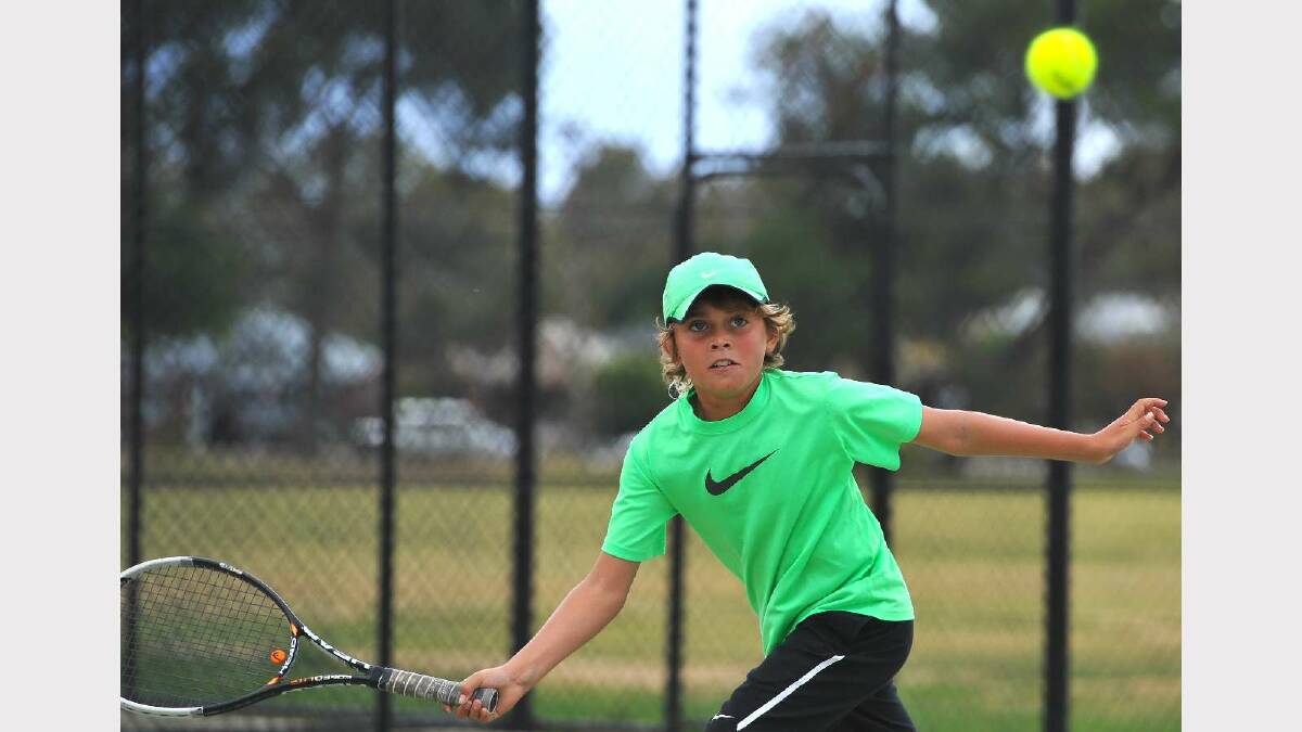 Adrian Foster competes in the Riverina Junior Tennis Open. Picture: Addison Hamilton