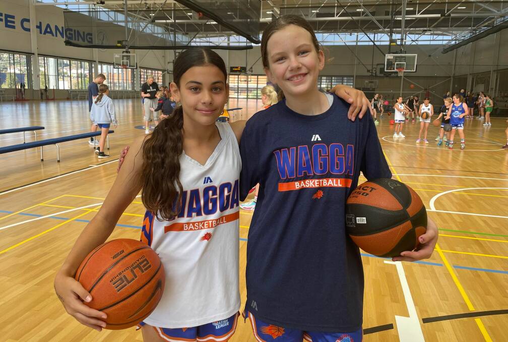 Anneliese Azer and Allencie Derrick, both 11, want to see more girls playing basketball. Picture by Tahlia Sinclair