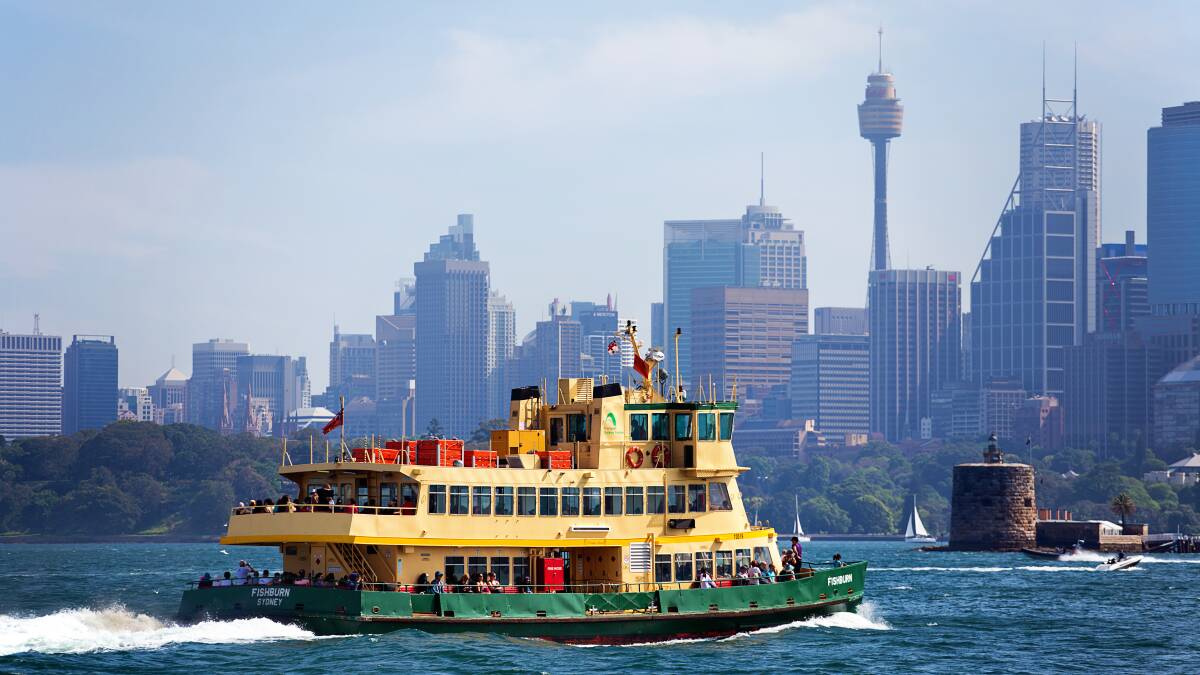 Scenic commuting: One of Sydney's iconic ferries heads towards Circular Quay.

