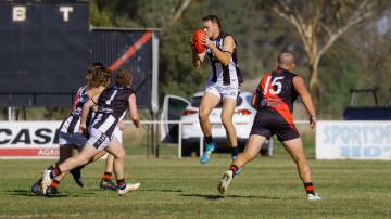 The Rock-Yerong Creek full-forward James Roberts grabs hold of the ball in the ANZAC Challenge against Marrar at Langtry Oval on Saturday. Picture by Bernard Humphreys