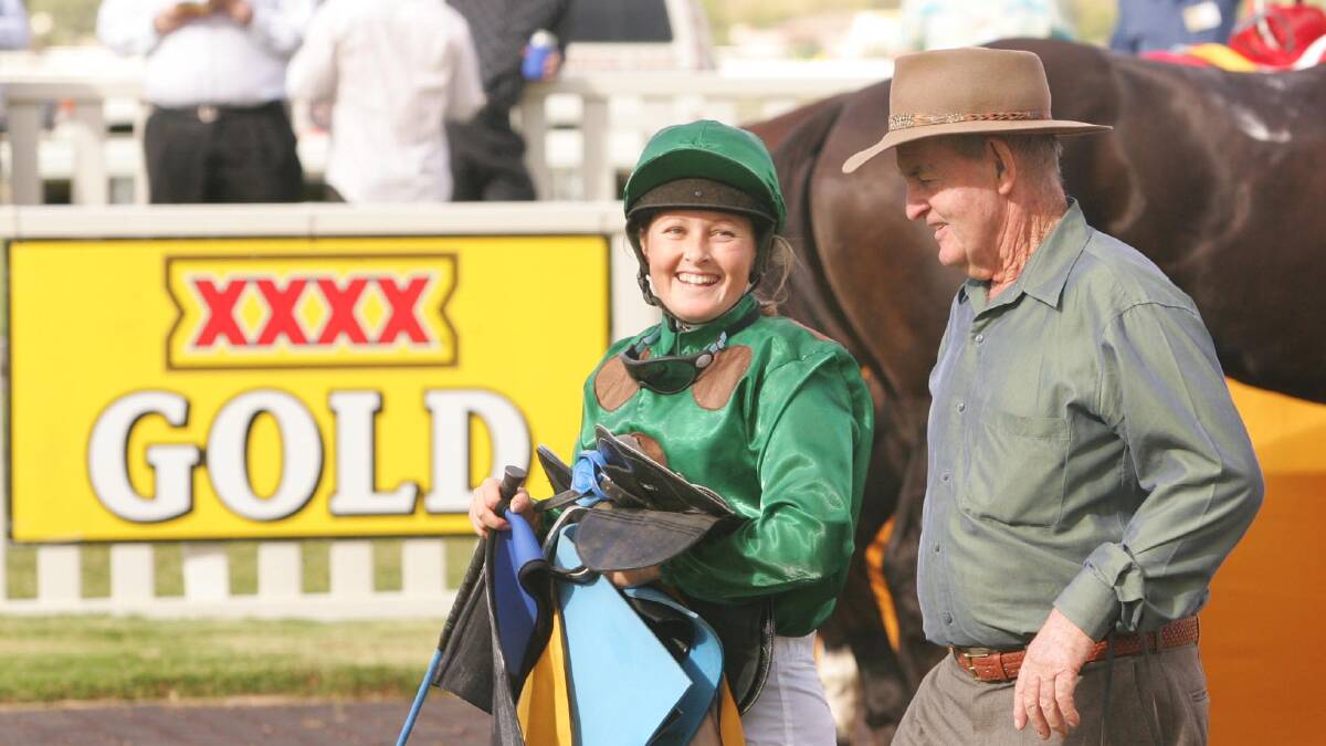 Peter Clancy with one of his stable apprentices, Shelley Pollard, at Murrumbidgee Turf Club back in 2007. Picture by Kieren L Tilly