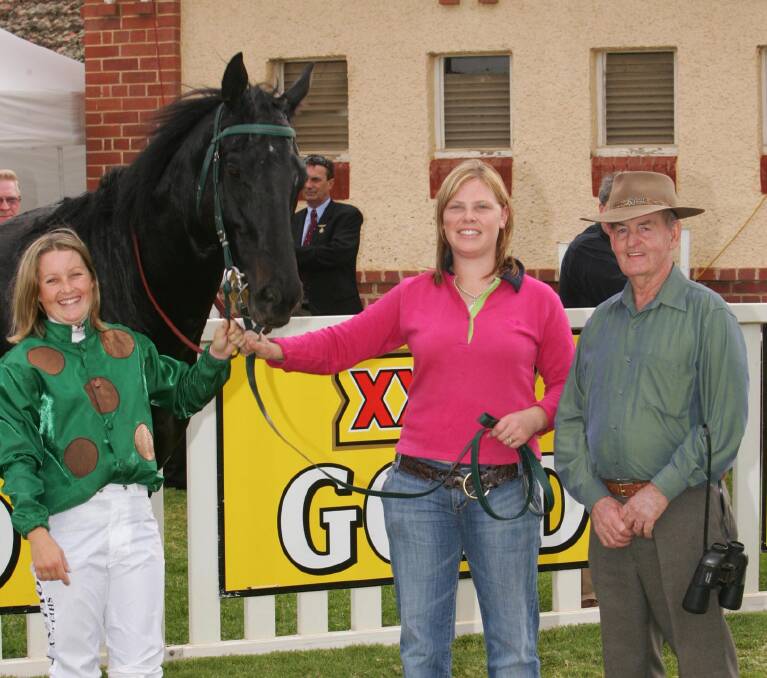 Shelley Pollard, strapper Joanne Clifford and trainer Peter Clancy with Zarvista after a win at Wagga in 2007. Picture by Kieren L Tilly