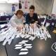 Wagga Women's Health Centre's Mary-Ellen Bradley and director Johanna Elms prepare white ribbons for the No More rally in Wagga on Sunday. Picture by Taylor Dodge