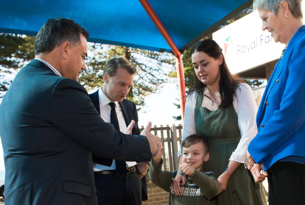Royal Far West CEO Lindsay Cane (right) with Deputy Premier John Barilaro (left) and Member for Manly James Griffin with Dominique and his mum Gemma Callinan, of Harden, NSW.