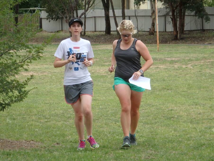 OUTDOORS:: Chontelle Dailey (left) and Izzy Hutchinson won event eight of the WaggaRoos Summer Orienteering Series at Lake Albert. Picture: Contributed
