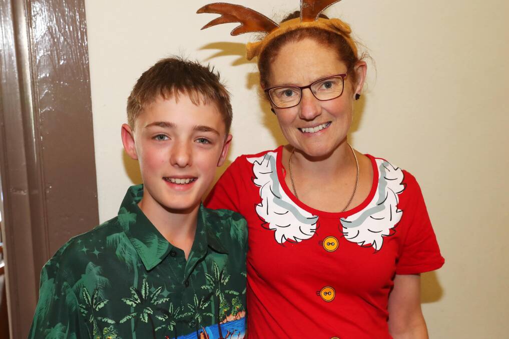 DECK THE HALLS: Henry, 12, and Marnie Stanyeriz at the Junee Christmas Carols at the Athenium last week. Picture: Emma Hillier