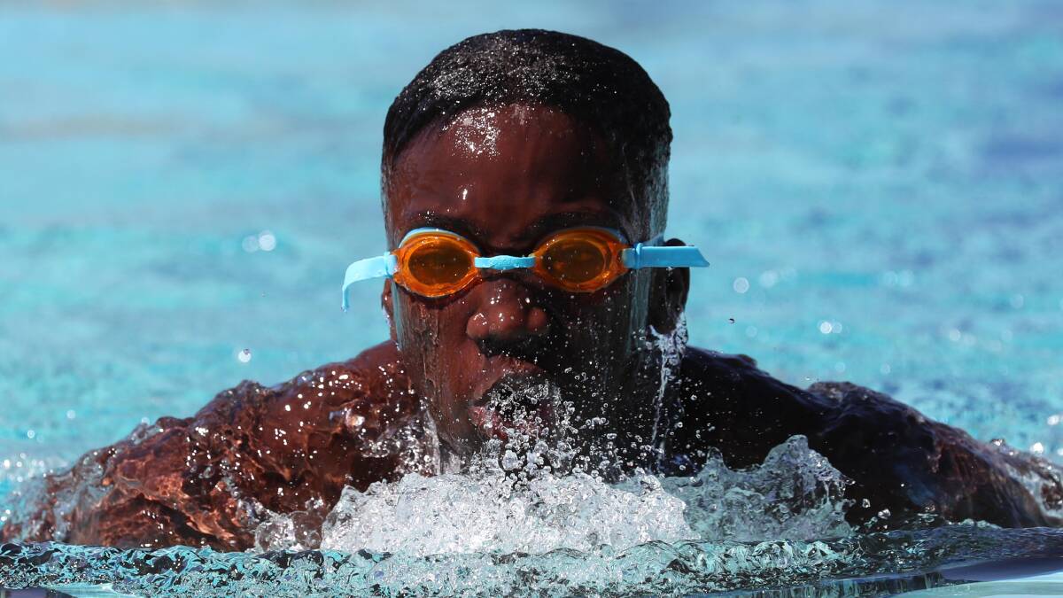 COMPETITIVE: Gerard Okerenyang competes in the 13-year breaststroke at The Riverina Anglican College swim carnival at the Oasis. Picture: Les Smith