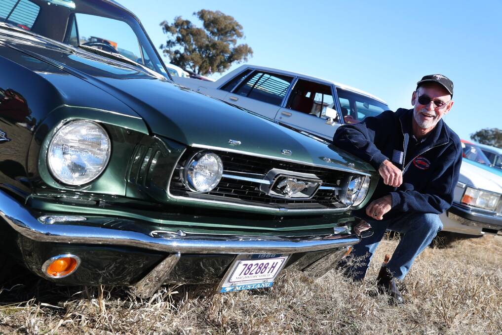 CLASSIC: Jim Owen with his 1966 Mustang, 'Ivy', at the Vintage Motor Club Show, June Rally. Picture: Emma Hillier
