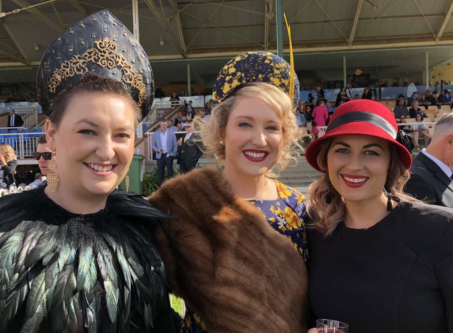 GLAM SQUAD: Katharine Graham, Renee Pascall and Leah Edyvean, all from Wagga, celebrate while looking stylish at the Gold Cup.
