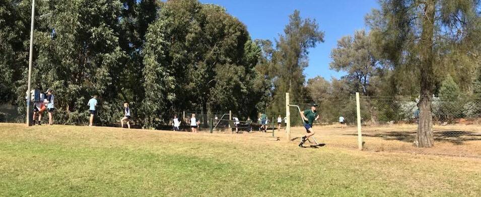 RACE: It is helter skelter as first leg runners head into the bush at the start of the Riverina Schools Orienteering Day Relay.