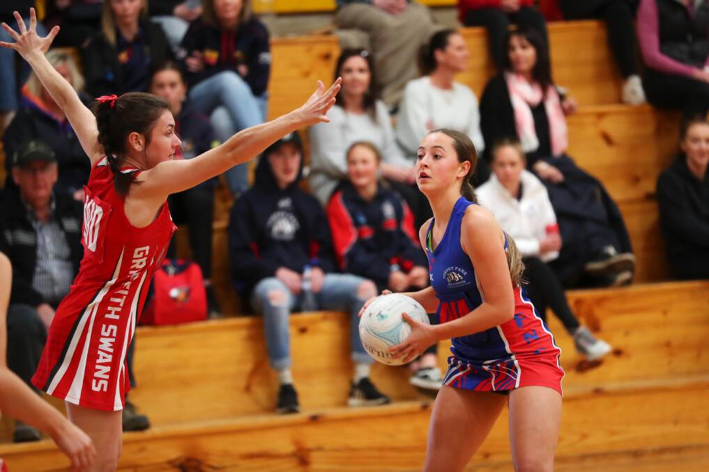 COURT ACTION: Abbey Corbett during the A Grade netball match between Turvey Park and Griffith. Pictures: Emma Hillier and Les Smith