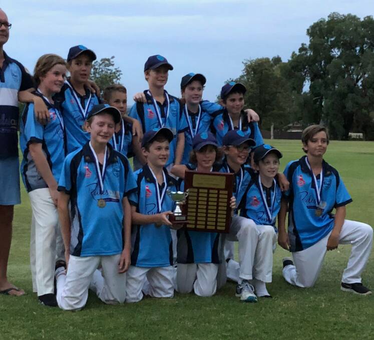 CHAMPIONS: The grand final winners -  South Wagga Blues Under 12s - celebrate their cricket win at the weekend. Picture: Contributed