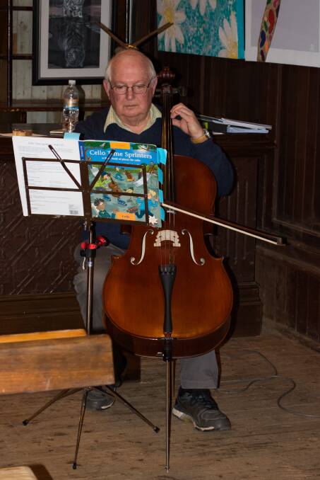 TALENT: Local musician John Bond added a wonderful atmosphere with his cello at the Up2Date art exhibition opening in Coolamon. Picture: Contributed