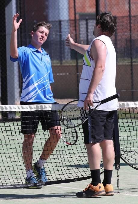 GOOD GAME: Leon Hemmings, of Wagga, plays against Igor Nikityuk, originally from Russia, during the Riverina Open at the Jim Elphick Tennis Centre. Picture: Les Smith