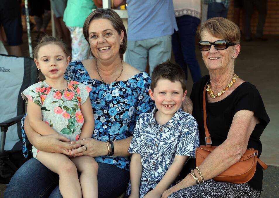 FAMILY FUN: Sophie-Rose Smith, 2, from Junee, Julie Hedlund, Junee, Edward Knight, 6, Wagga and Linda Hulford, of Waggaa at the Junee trots last week. Picture: Les Smith