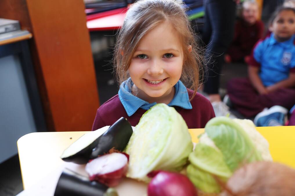 SCHOOL: Allaura Hartigan, 5, learns about fresh produce at National Science Week. Pictures: Emma Hillier