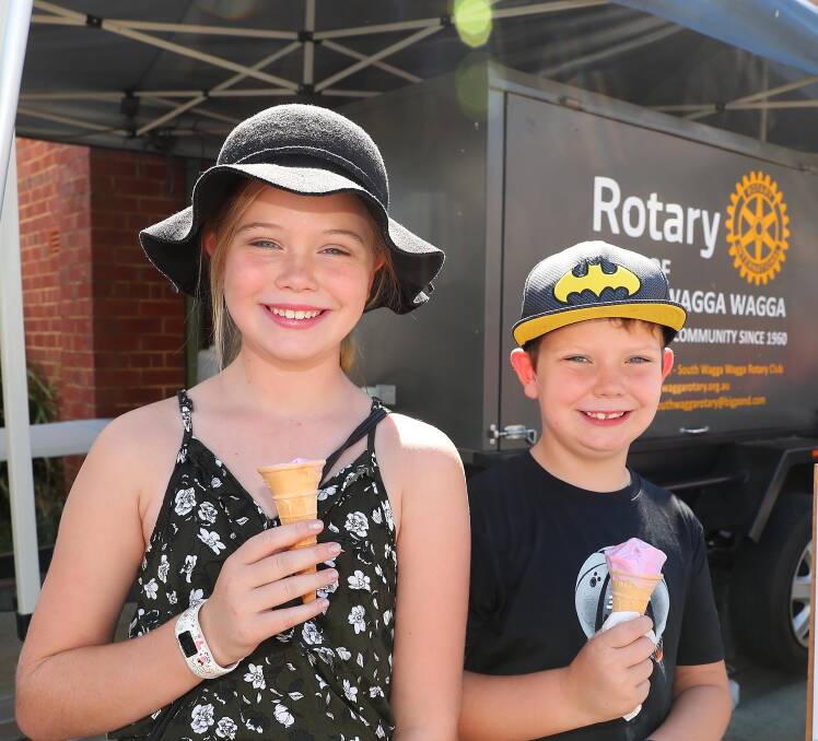 FUN IN THE SUN: Mia, 9, and Jordan Stephens, 8, of Wagga, cool down at the recent Leisurefest. Picture: Kieren L Tilly