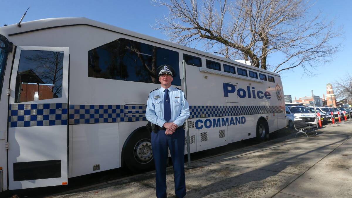 Mobile office: Murray River police district chief Superintendent Paul Smith with a converted bus being used to assist with the operation patrolling the NSW-Victorian border. Picture: TARA TREWHELLA