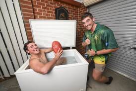 North Albury team-mates and housemates Darcey Cullen (left) and Brad Hutchison ham it up, ahead of Saturday's home game against Wodonga Raiders. Picture by Mark Jesser