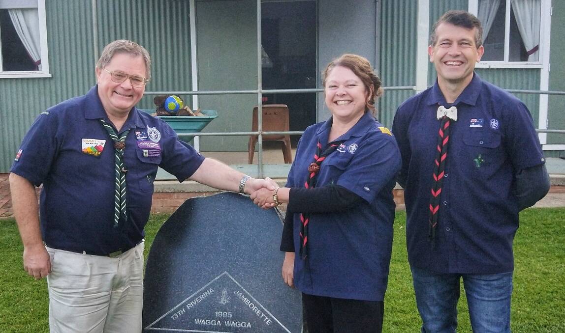 LEADERS HONOURED: Neville Tomkins is pleased to congratulate Dorothy (Jeannie) Roberts and Brad Addison on their achievement. Picture: Supplied 