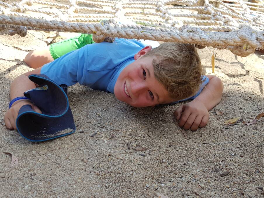 HEADS DOWN:  Wagga Scout Bailey Kotzur enjoys the Challenge Hill obstacles. Picture: Supplied 