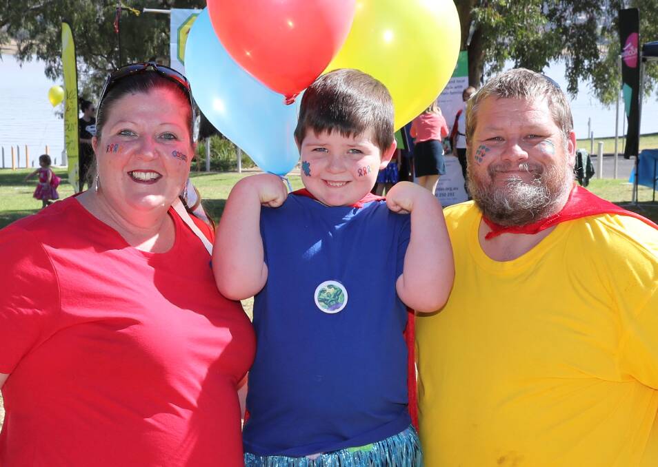 COLOURFUL SUPERHEROES: Jacinta and David Gordon with their son, six-year-old Jacob. Picture: Les Smith