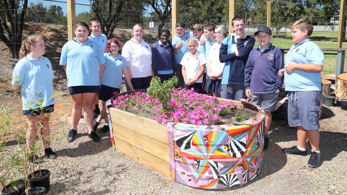 GROUP EFFORT: Some of the students who have helped create Wagga High School's new sensory garden.