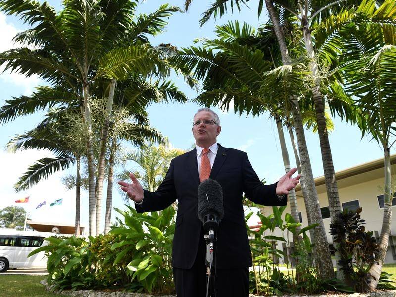 Scott Morrison has made a flying visit to Port Vila on his way to Suva.