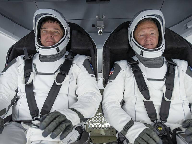Bob Behnken (L) and Doug Hurley have returned after a two-month voyage on board SpaceX Crew Dragon.