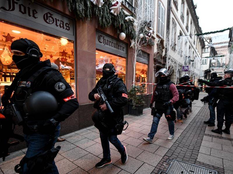 Police are hunting a gunman after three people were shot dead near a Christmas market in Strasbourg.
