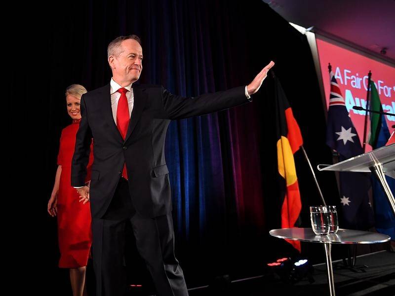 Bill Shorten, with wife Chloe, has given up the Labor leadership after losing the election.