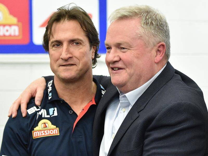 Western Bulldogs chairman Peter Gordon (right) has railed against gambling's influence on the AFL.