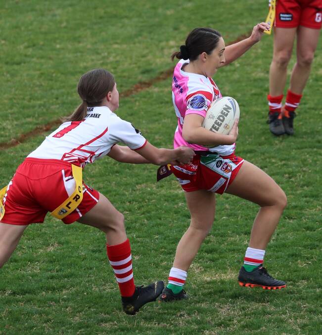TAGGED: Temora's Emily Perrot tags Madison Dunn in Group 9 League Tag on the weekend.