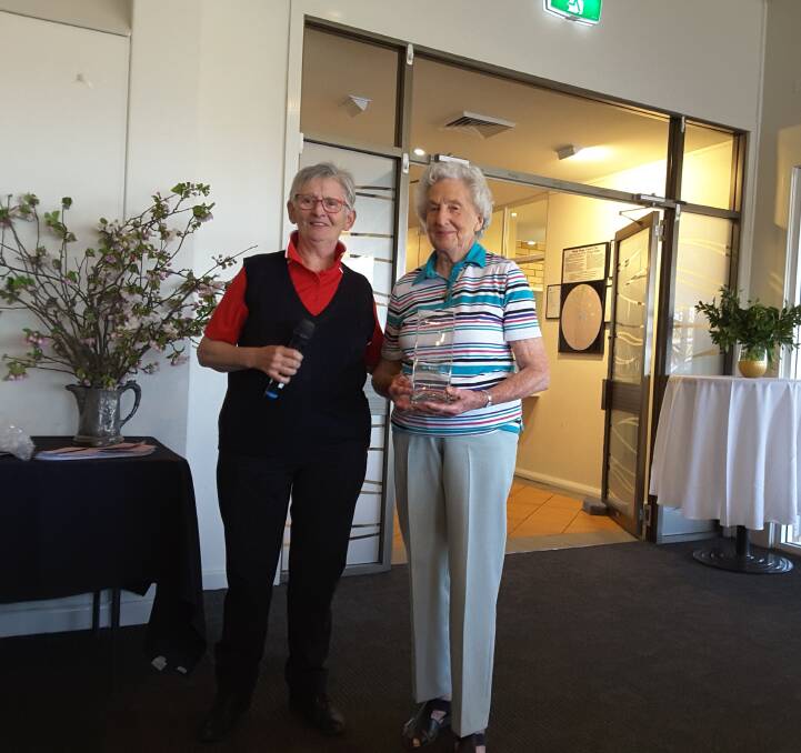 WELL DONE: Vi Gardner receives her trophy from the captain of the Riverina Ladies Golf Association, Gail O'Halloran, at the Country Club. 