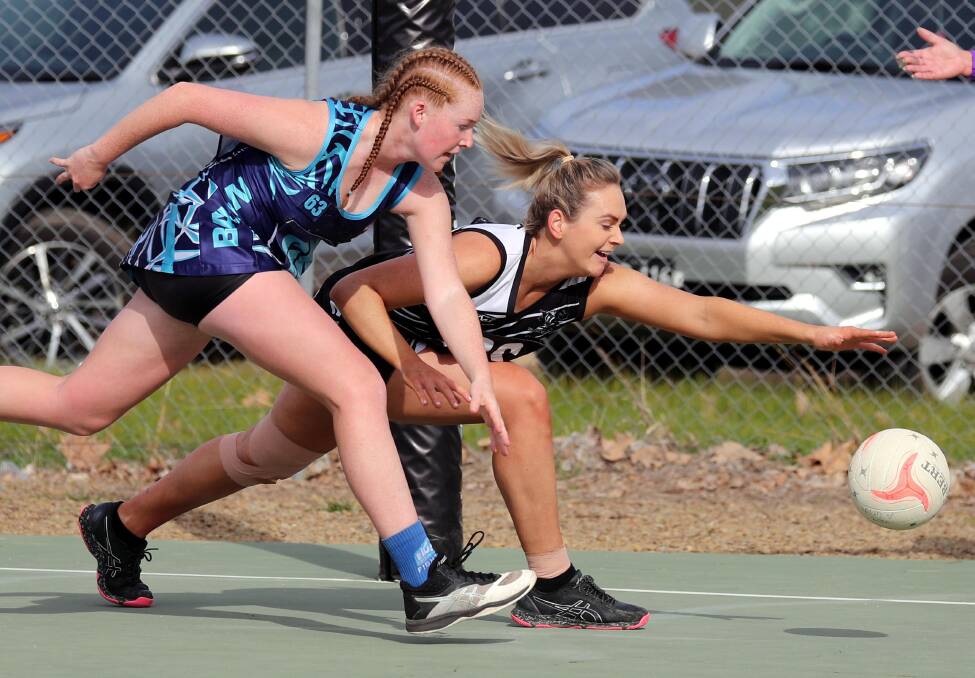 CONTEST: Barellan's Katie Anderson and TRYC's Ella Finemore race to the netball in Farrer League netball on the weekend. Photo: LES SMITH