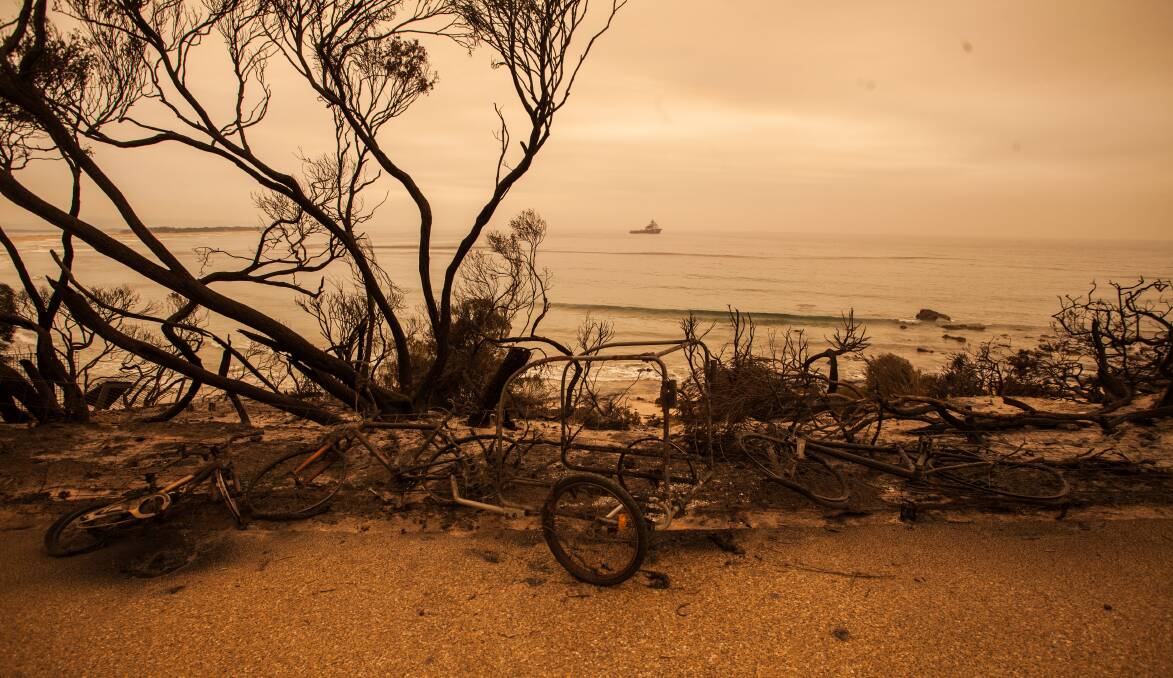 Charred bikes ridden to the safety of the beach. Mallacoota, Victoria. New Year's Day 2020. Picture: Rachel Mounsey