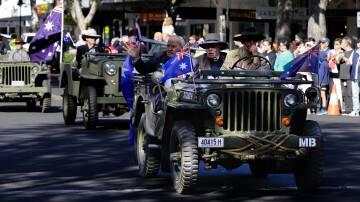 Veterans, some of whom were in jeeps and buggies, led current serving members of the defence forces, students, cadets and band members up Baylis Street on Thursday morning. Picture by Bernard Humphreys
